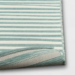 5'x7' Narrow Wornstripe Rectangular Woven Outdoor Area Rug Turquoise Blue - Threshold™ 7 5'x7' Narrow Wornstripe Rectangular Woven Outdoor Area Rug Turquoise Blue - Threshold™ -Threshold GUEST de24221f eb98 4b3d 8215 da45667ce98e